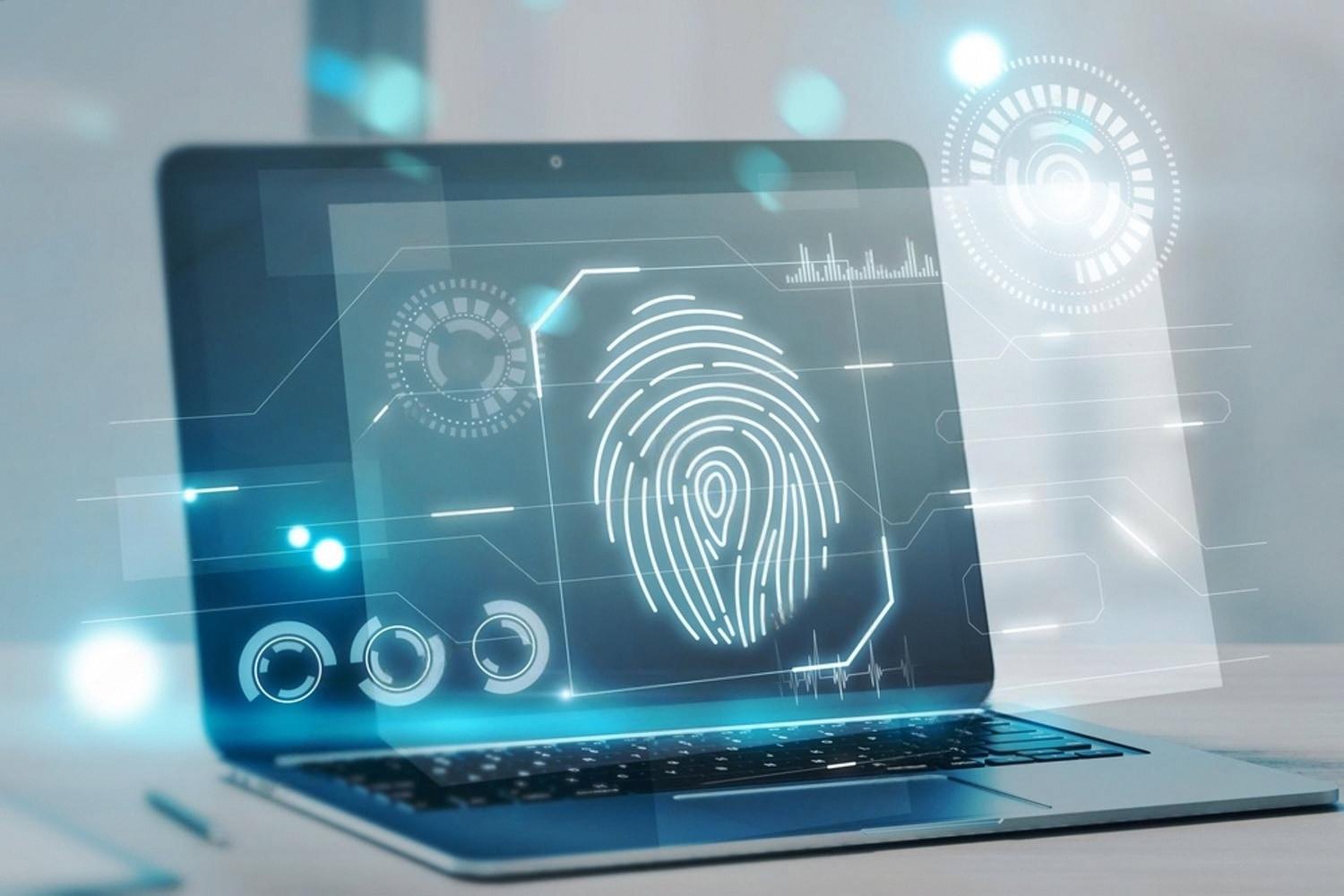 Biometric fingerprint authentication on a laptop, illustrating secure hotel self check-in